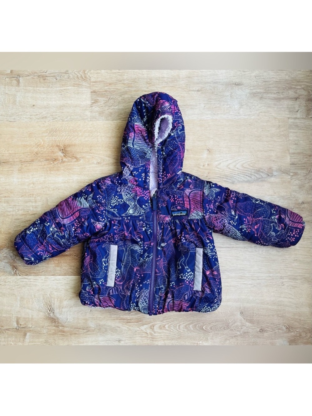 Patagonia Girls Hooded Puffer Jacket in Navy and Purple Print